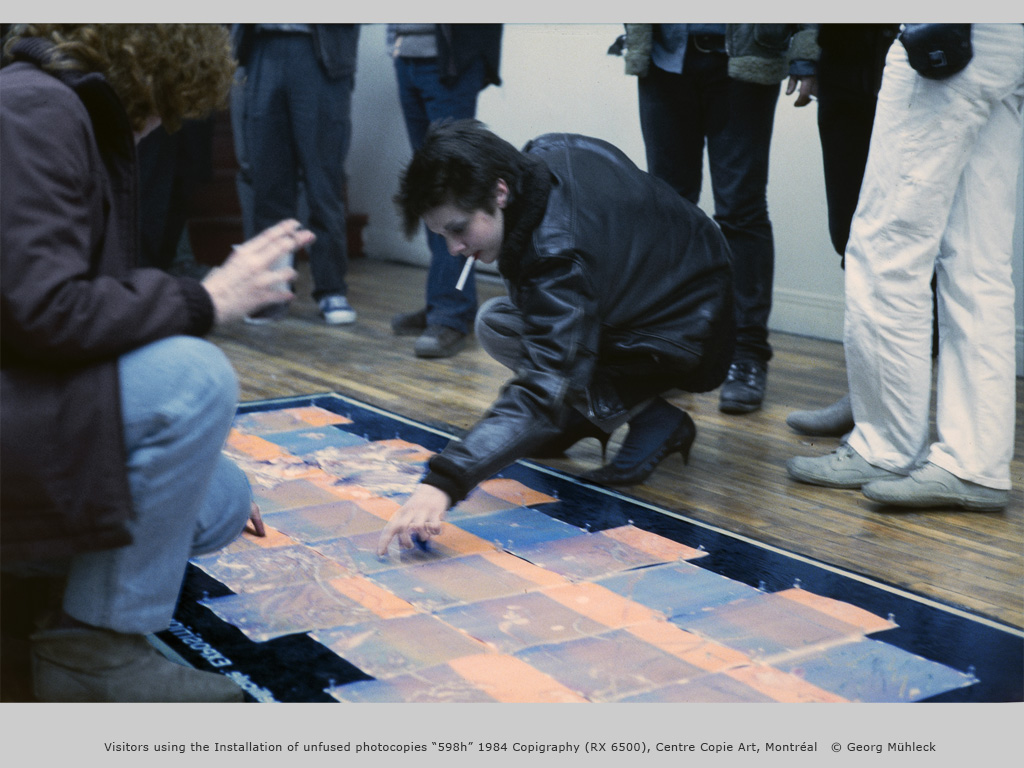 Visitors using the Installation of unfused photocopies “598h” 1984 Copigraphy (RX 6500), Centre Copie Art, Montréal